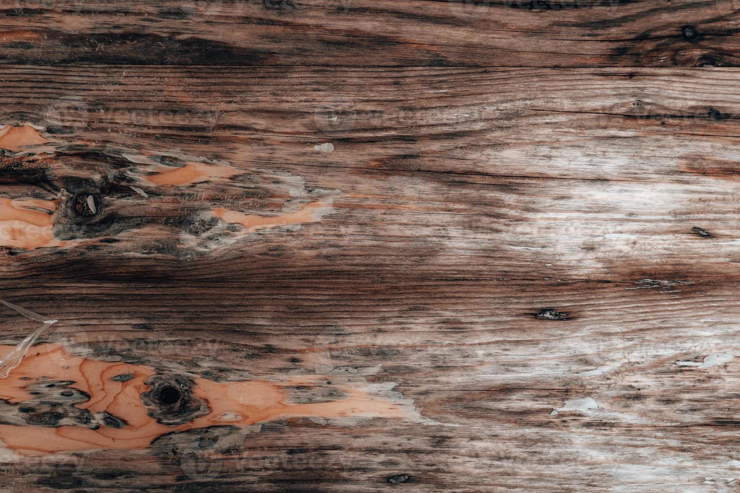 Wood texture background, weathered brown plank from barn photo