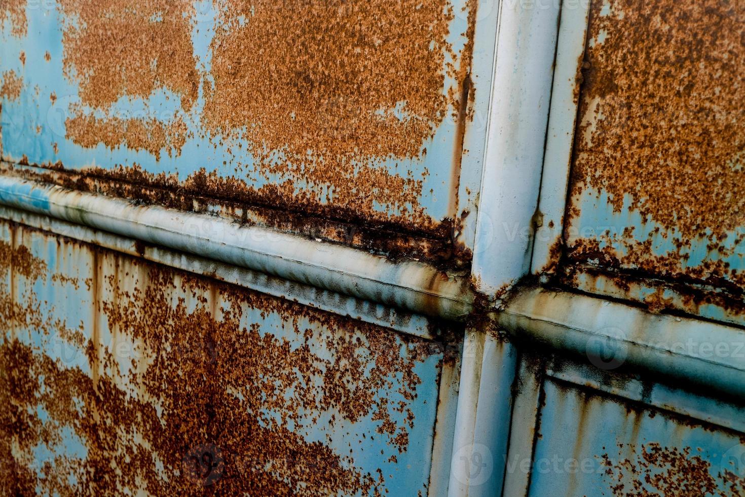 Grunge rusty metal texture. Rusted and oxidized background. photo