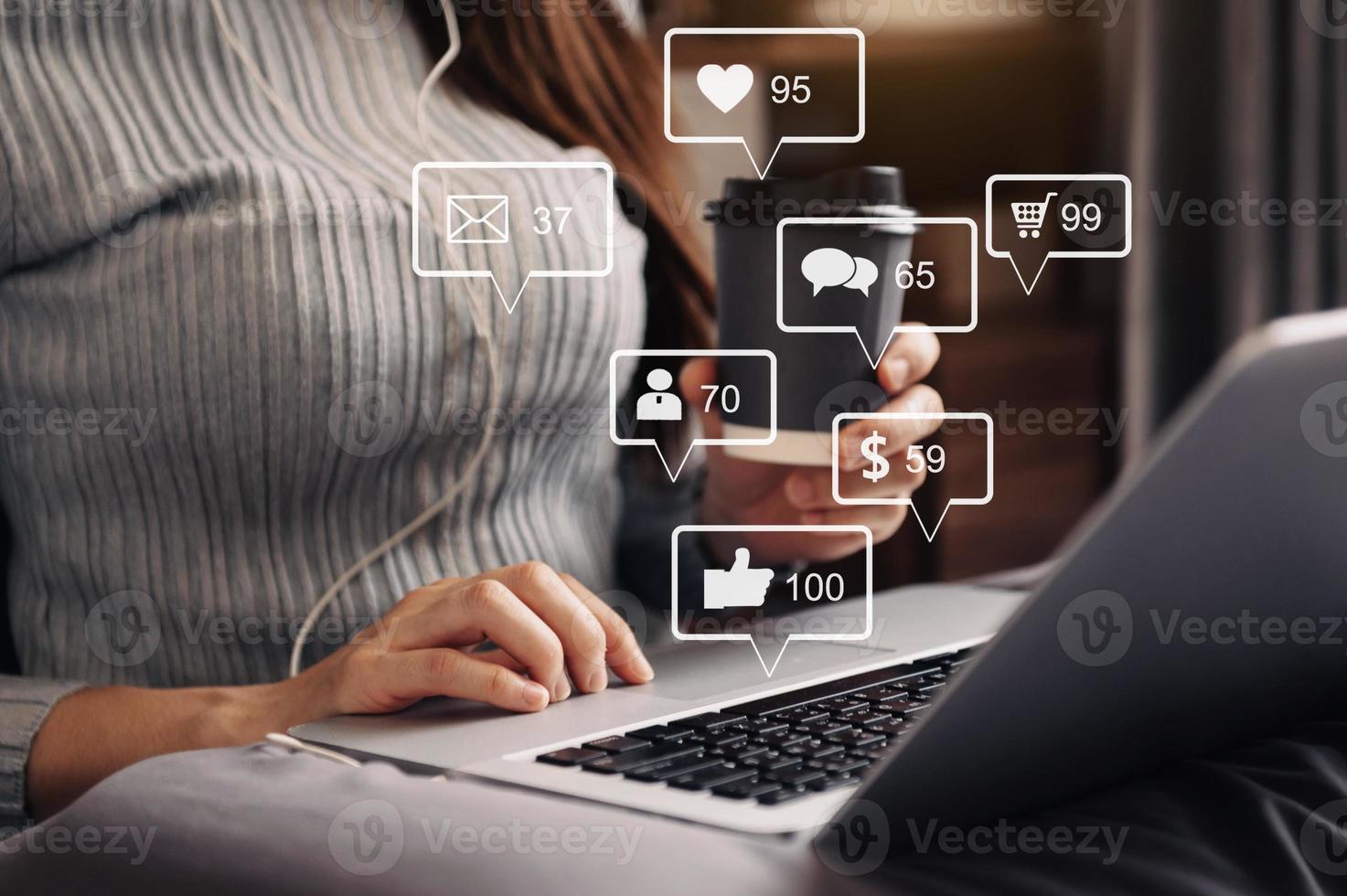 Social media and Marketing virtual icons screen concept.close up of businesswoman typing keyboard photo