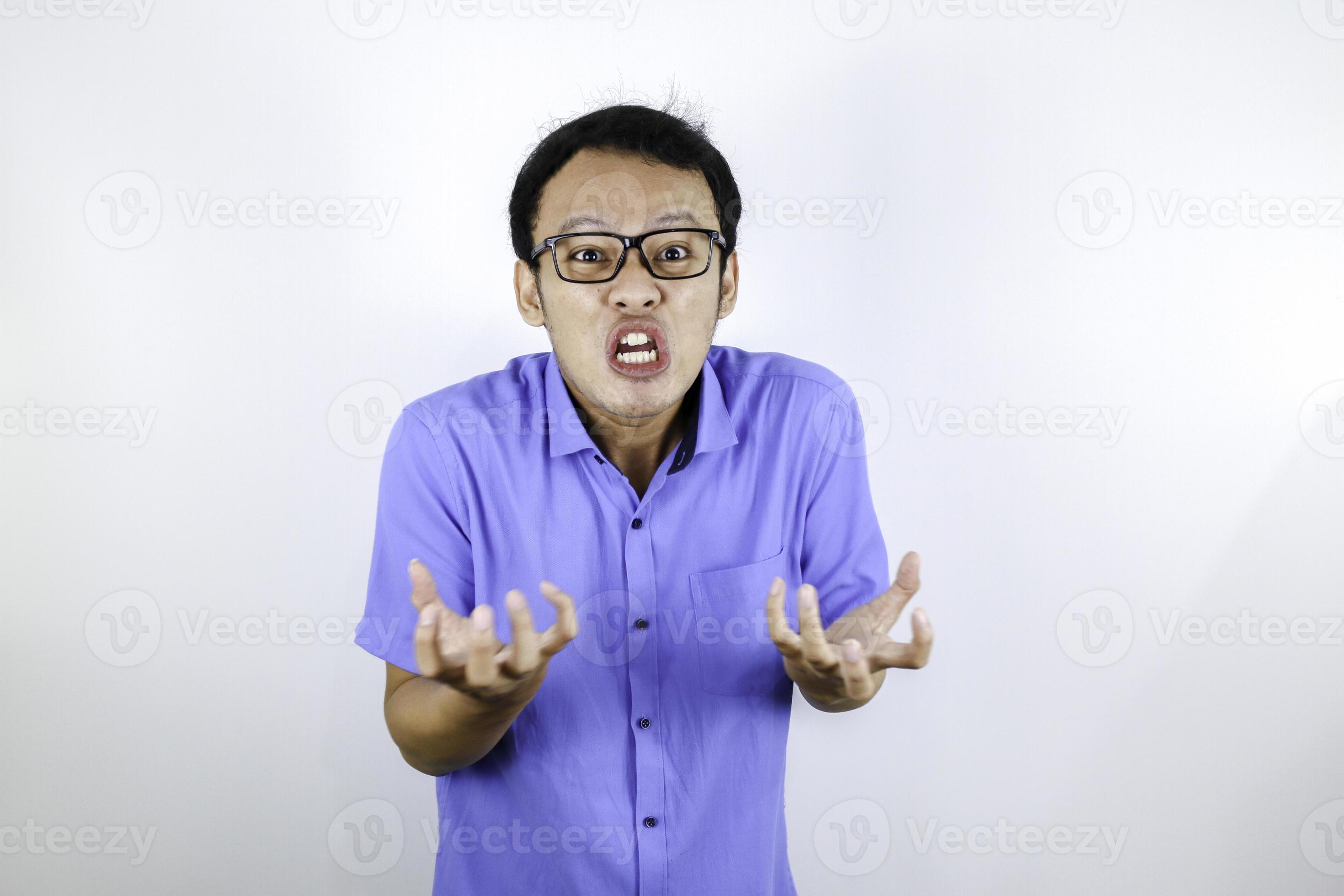 Young Asian Man wear blue shirt is funny angry face with shouting and pointing finger at camera isolated over white background 6162707 Stock Photo at Vecteezy Young Asian Man wear blue shirt is funny angry face with shouting and pointing finger at camera isolated over white background 6162707 Stock Photo at Vecteezy