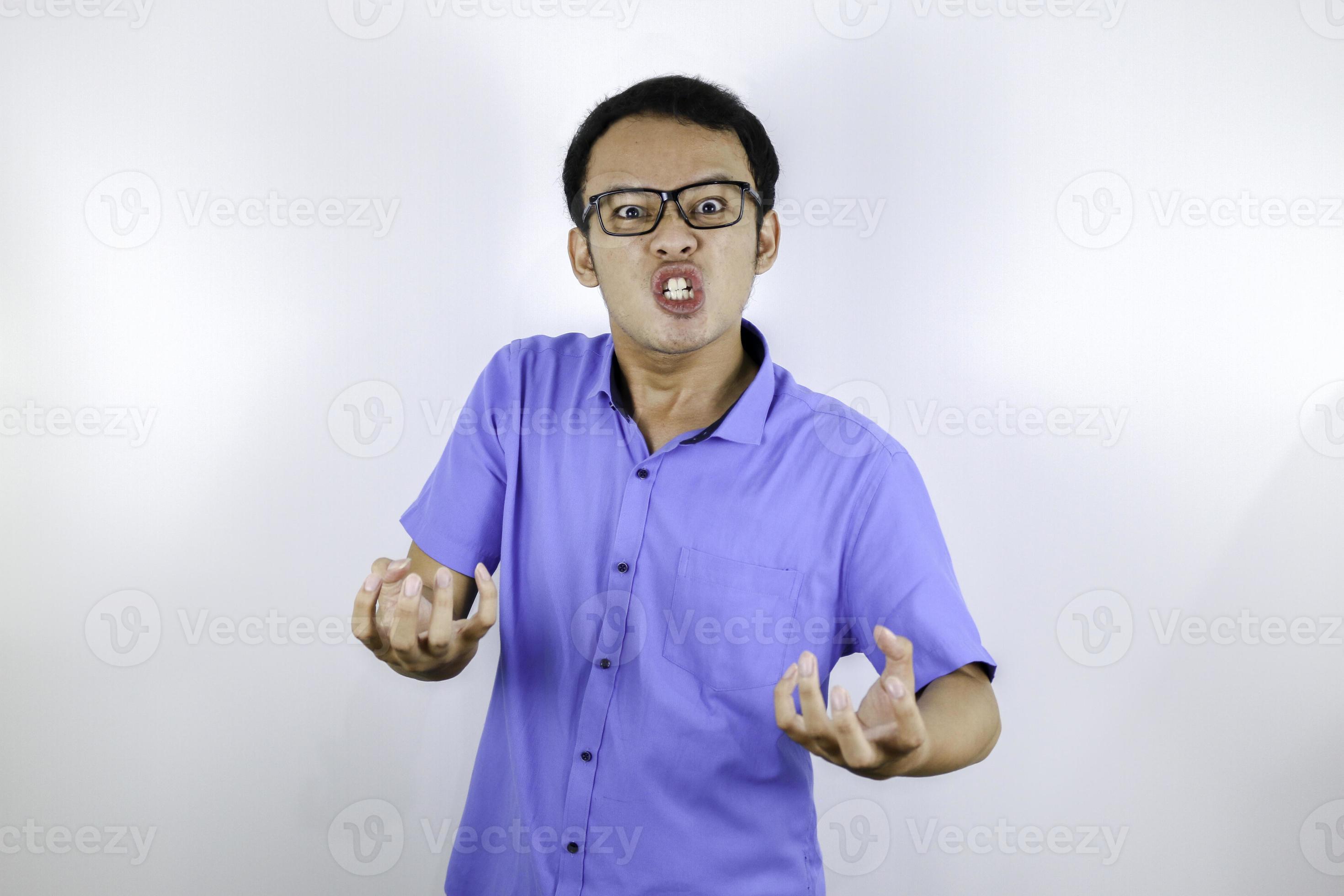 Young Asian Man wear blue shirt is funny angry face with shouting and  pointing finger at camera isolated over white background 6162710 Stock  Photo at Vecteezy