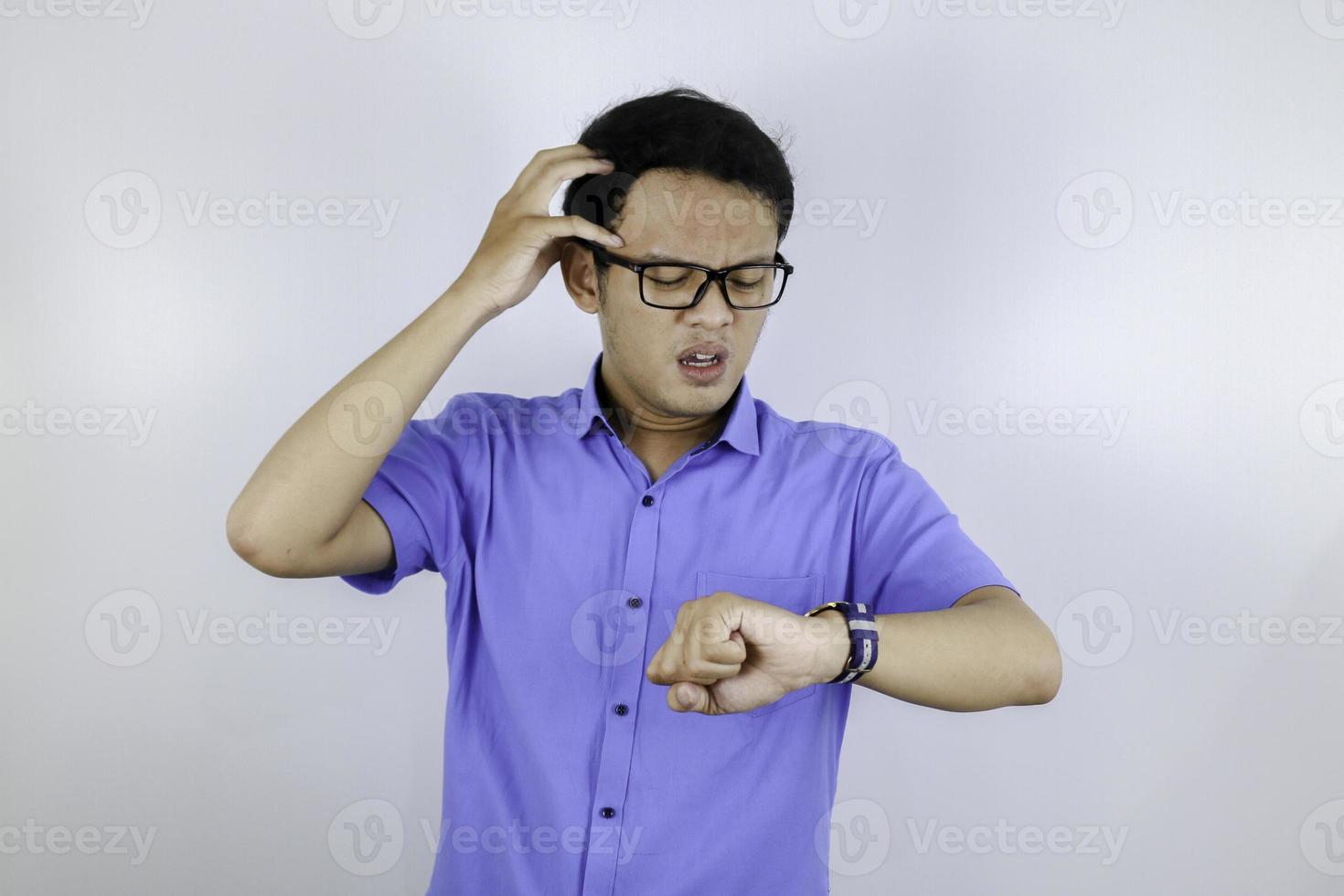 Being late to work and deadline, Young asian man is time delay and late on project. Executive angry, hurry, stress, frustrated and unsatisfied worker man lateness to office. photo