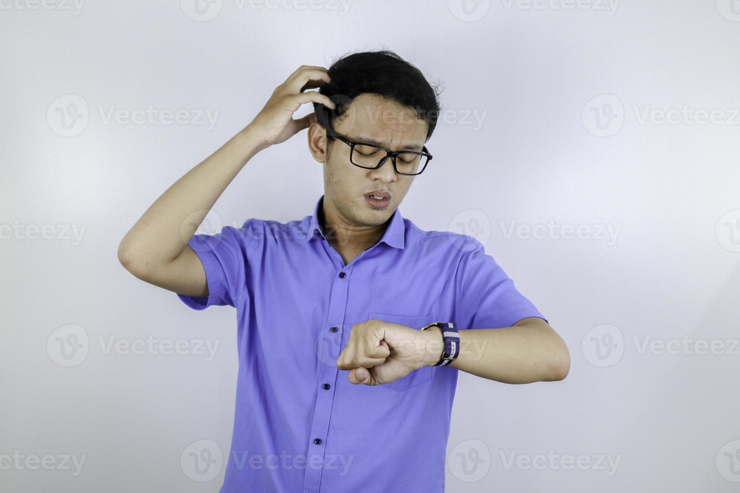 Being late to work and deadline, Young asian man is time delay and late on project. Executive angry, hurry, stress, frustrated and unsatisfied worker man lateness to office. photo