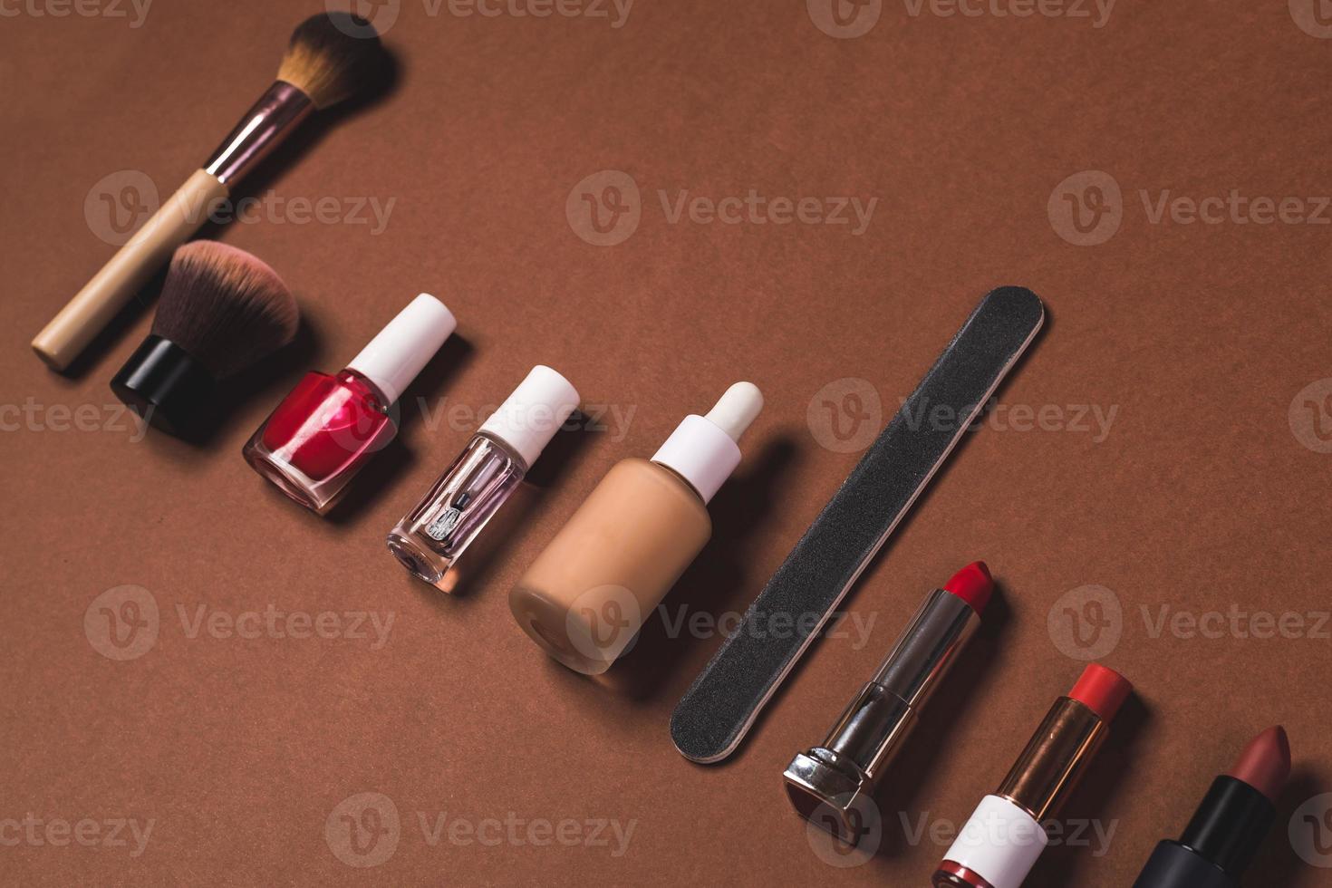 make up stuff on a brown background photo