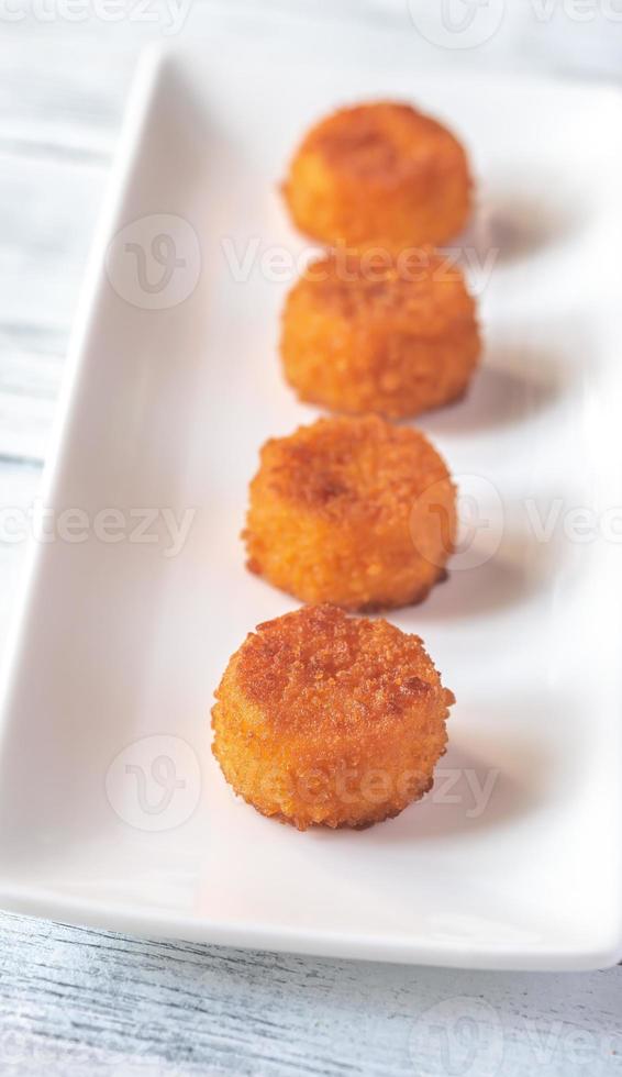 Camembert nuggets closeup photo