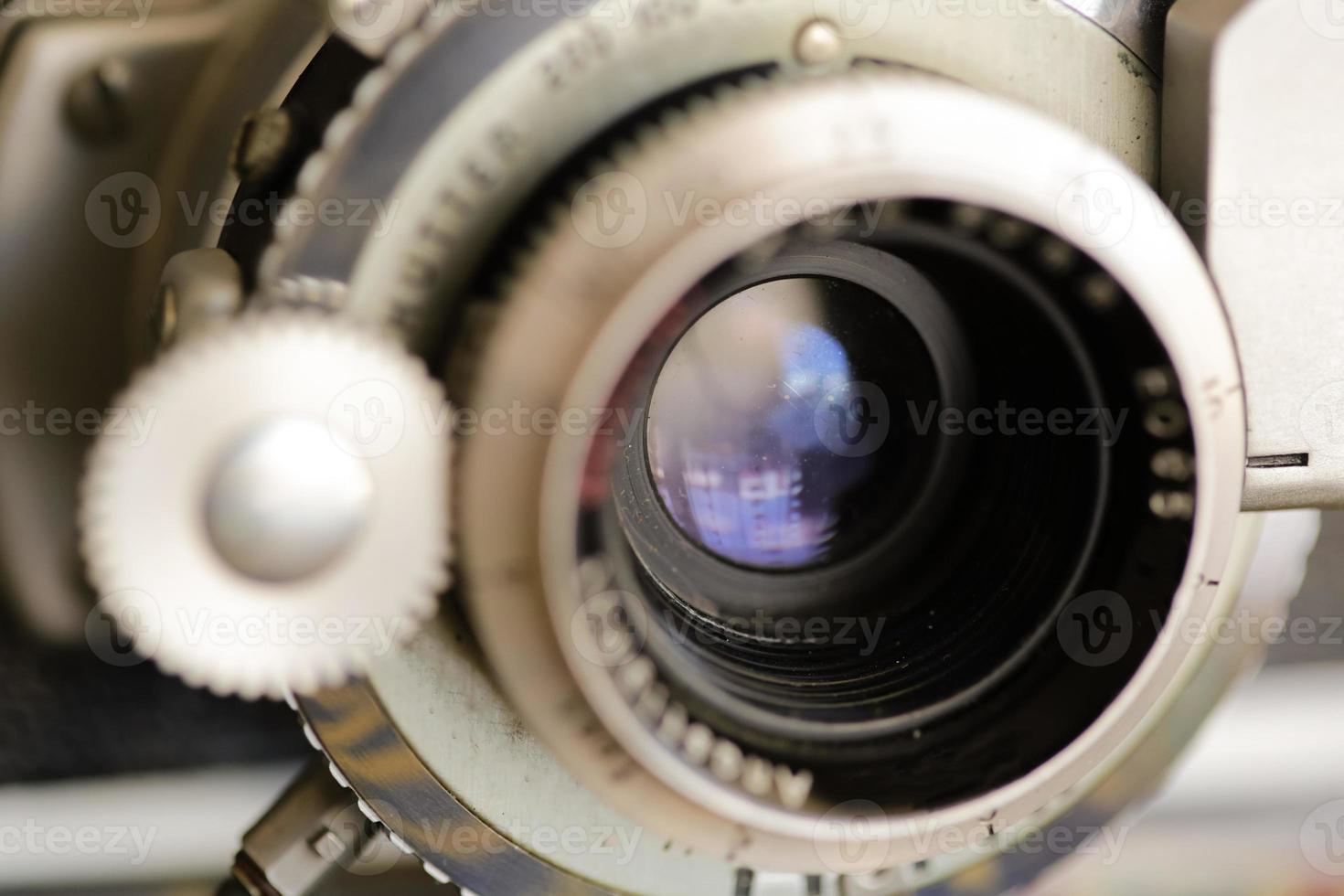 Vintage old photography film camera with lens. Close up macro shot photo