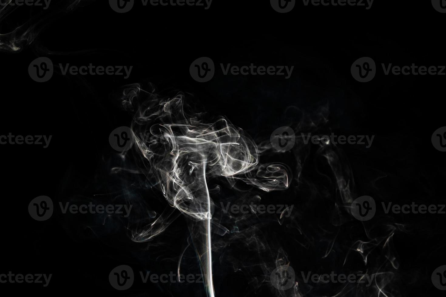 Smoke effect texture. Isolated background. Black and dark backdrop. Smokey fire and mistic effect. photo