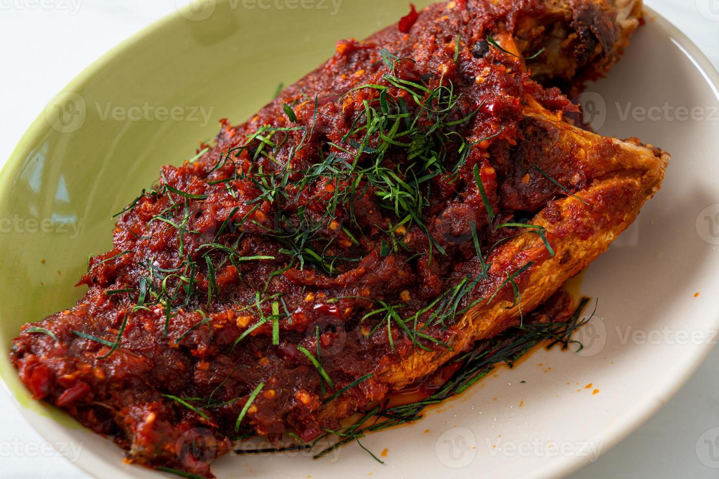 Deep fried fish and chili sauce photo