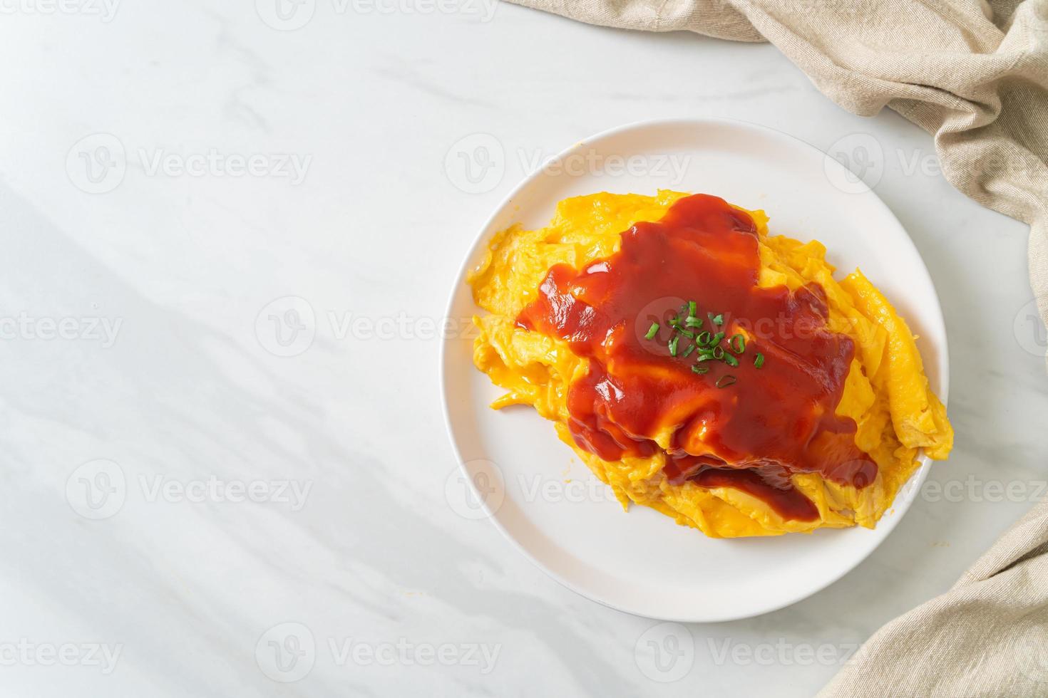 Flavored Fried Rice in an Omelet Wrapping photo