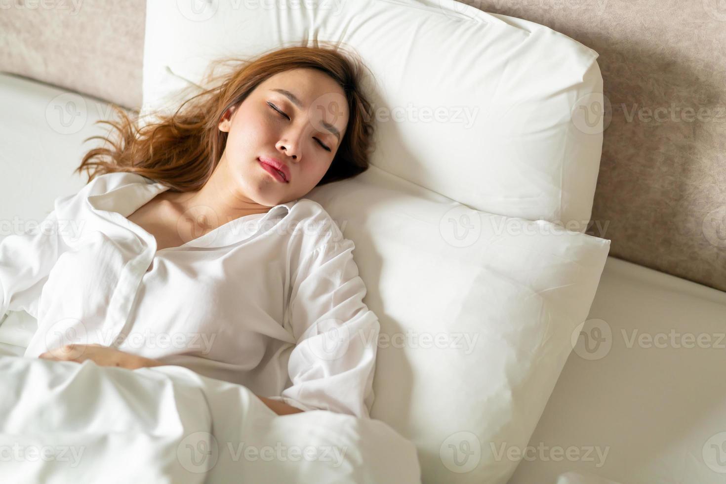 portrait beautiful woman sleeping on bed photo