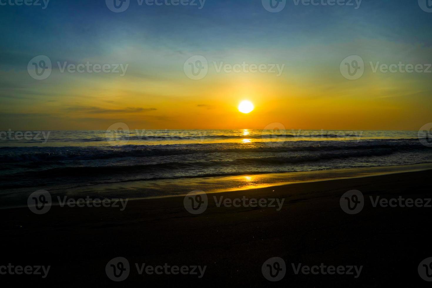 Beautiful sunset over the sea with colorful sky photo