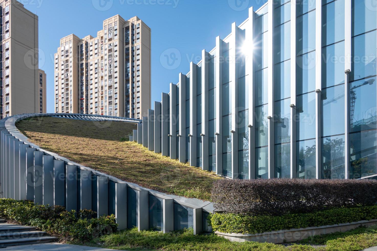 Part of modern urban glass mixed buildings is in blue sky and good weather photo