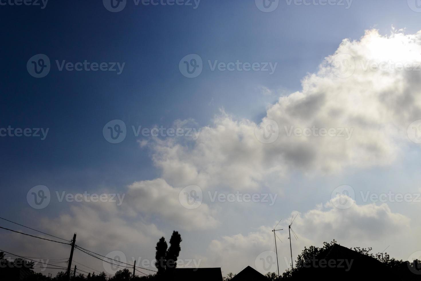 Clouds and blue sky background with copy space photo