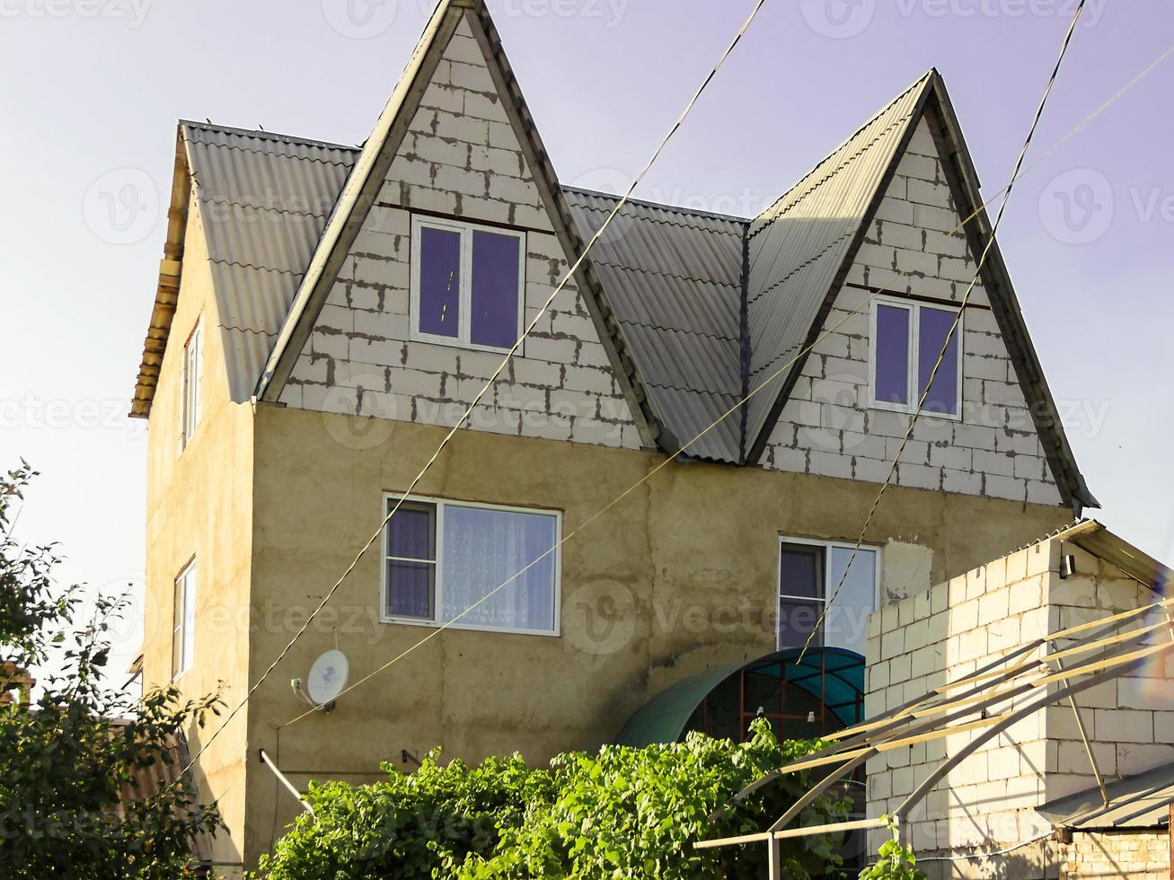 Two-storey modern city cottage in summer beautiful photo