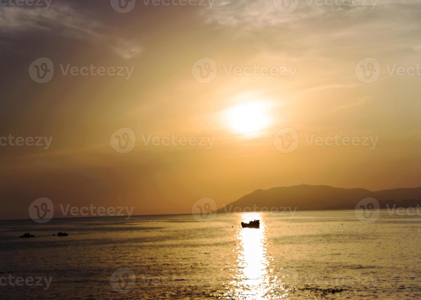 beautiful sunset on the Black Sea in summerin the village of Kabardinka photo