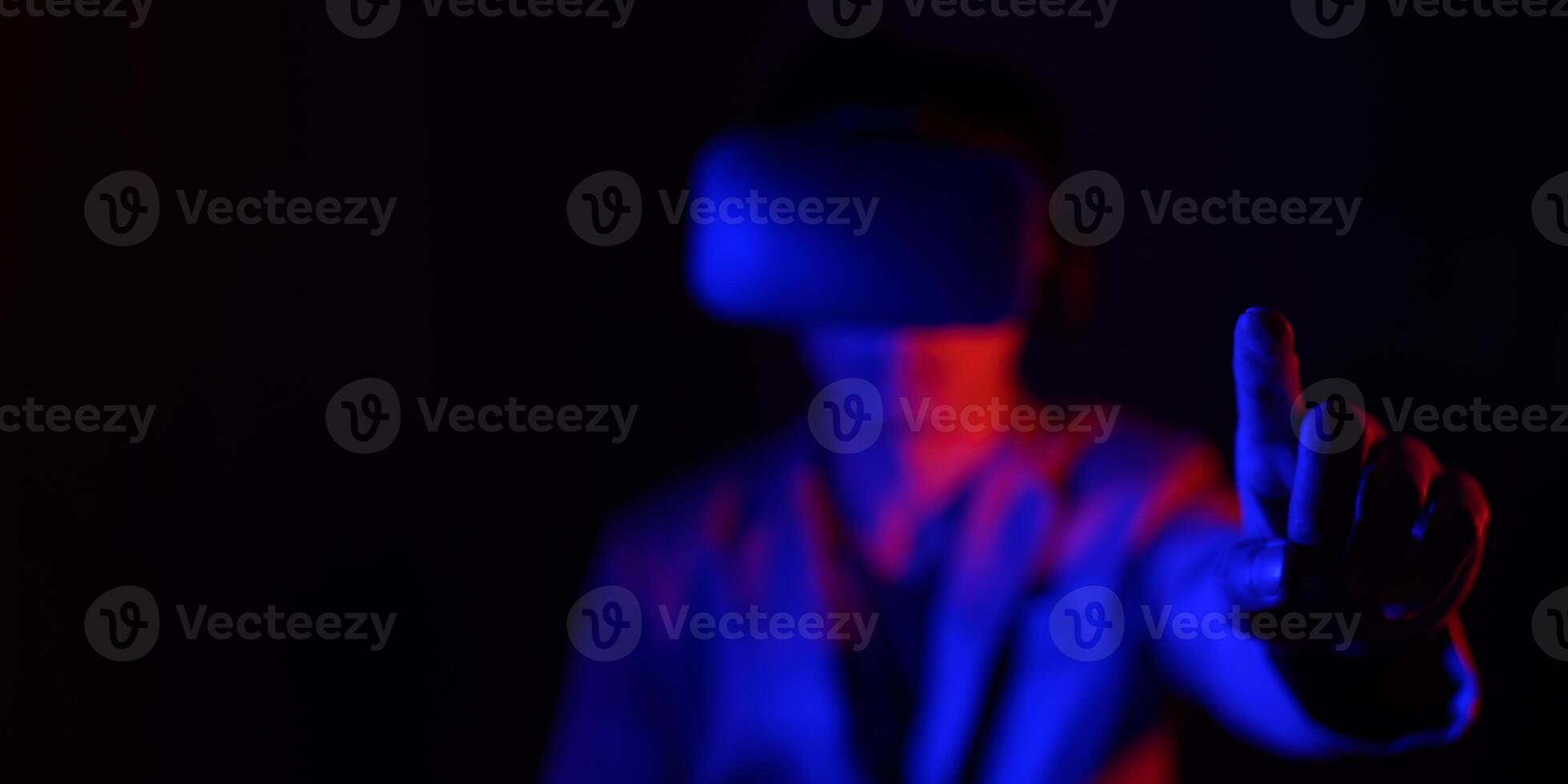 A person wearing a virtual reality headset photo