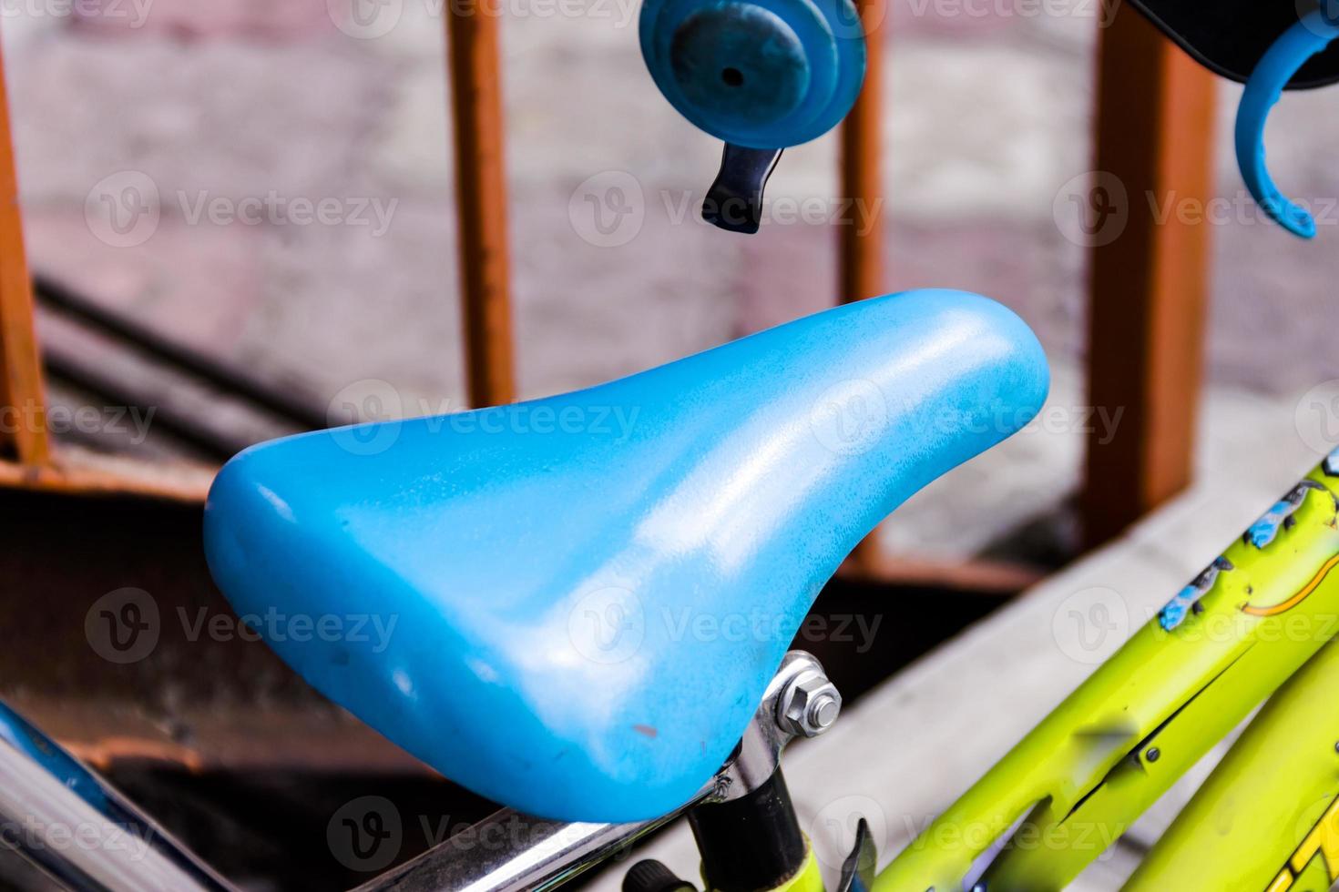 blue seat on a children bike photo