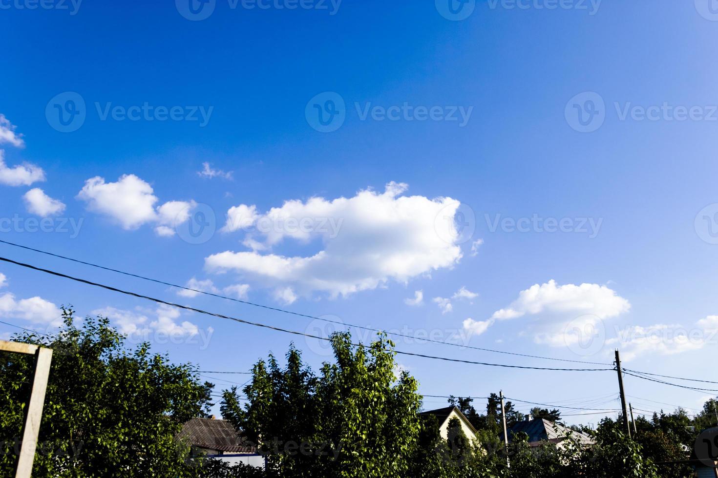 Clouds and blue sky background with copy space photo