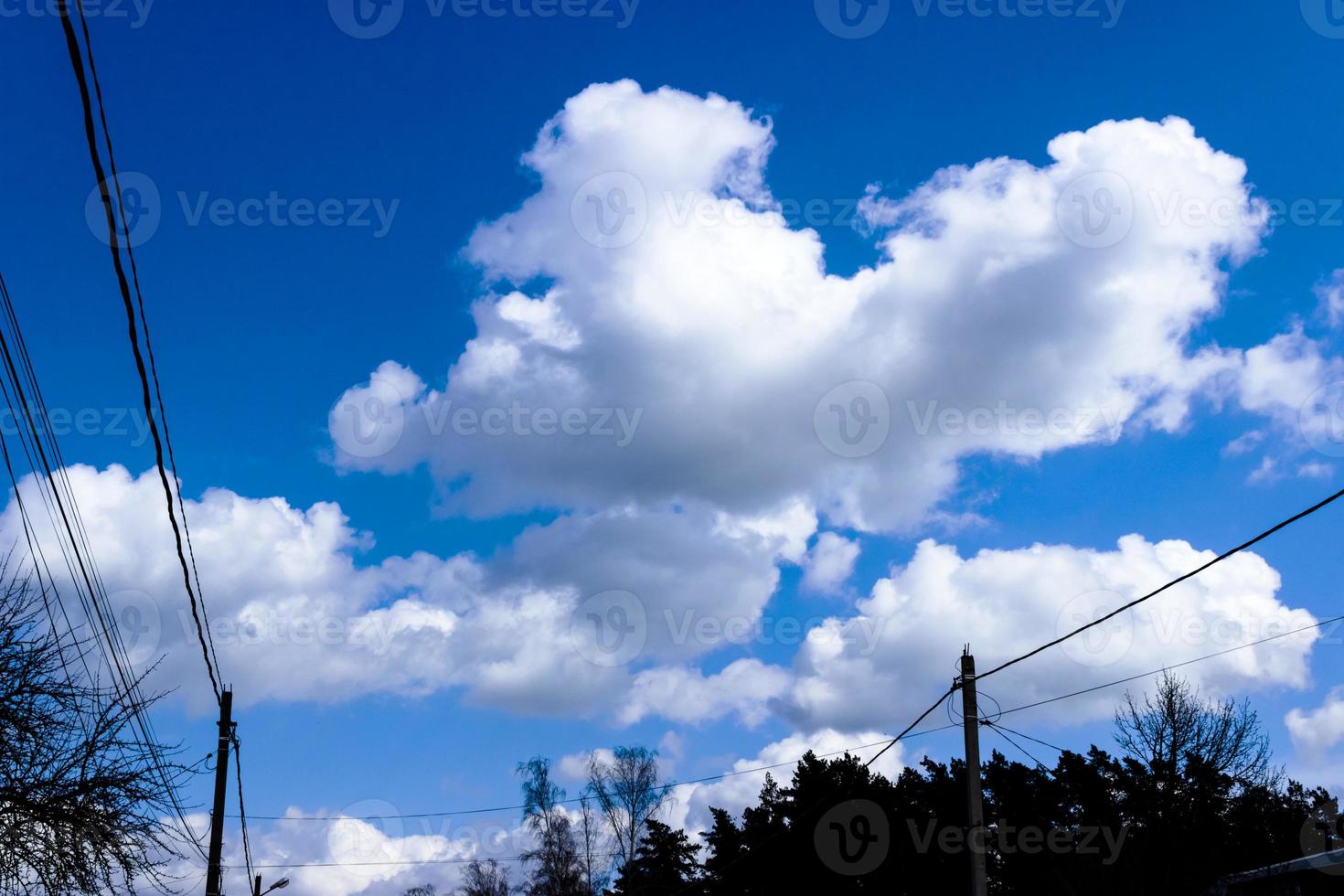 Clouds and blue sky background with copy space photo