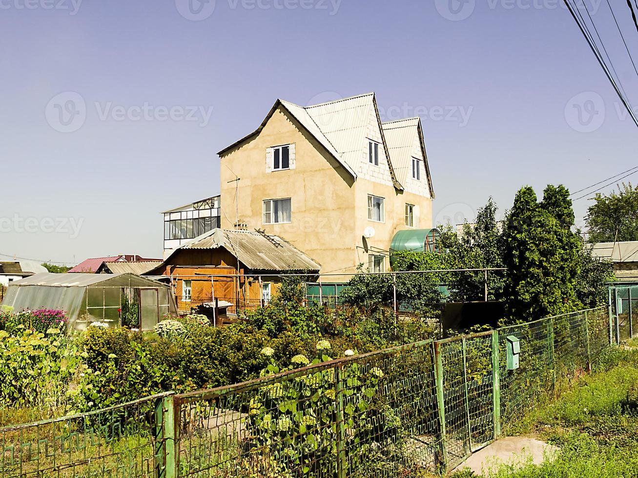 Two-storey modern city cottage in summer beautiful photo