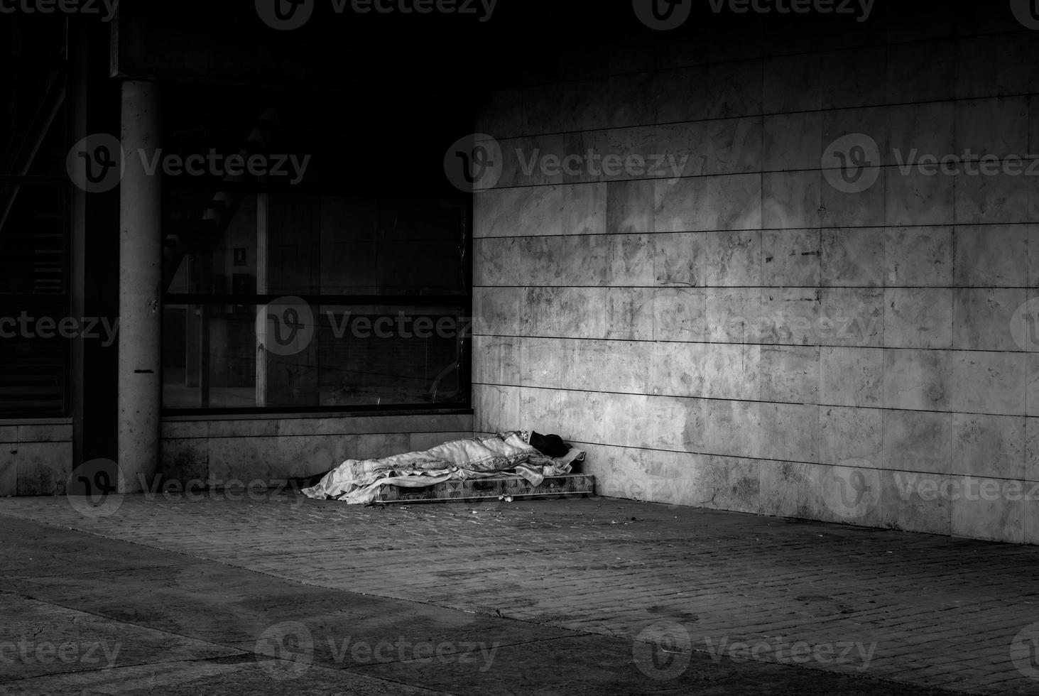 Person sleeping on the street photo