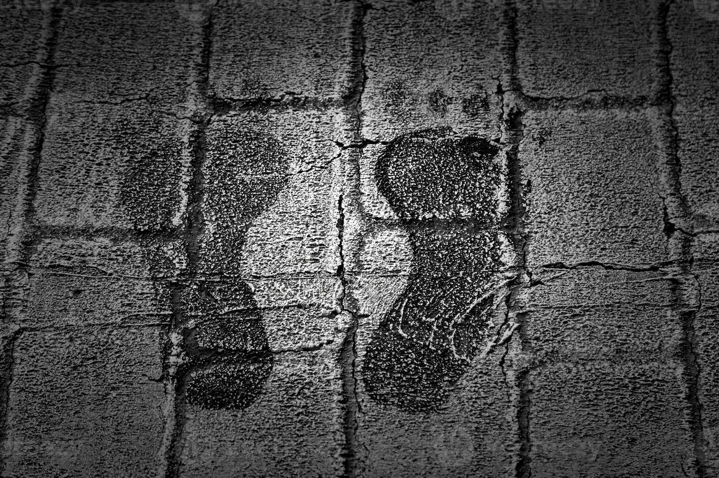 Footprints on zebra crossing photo