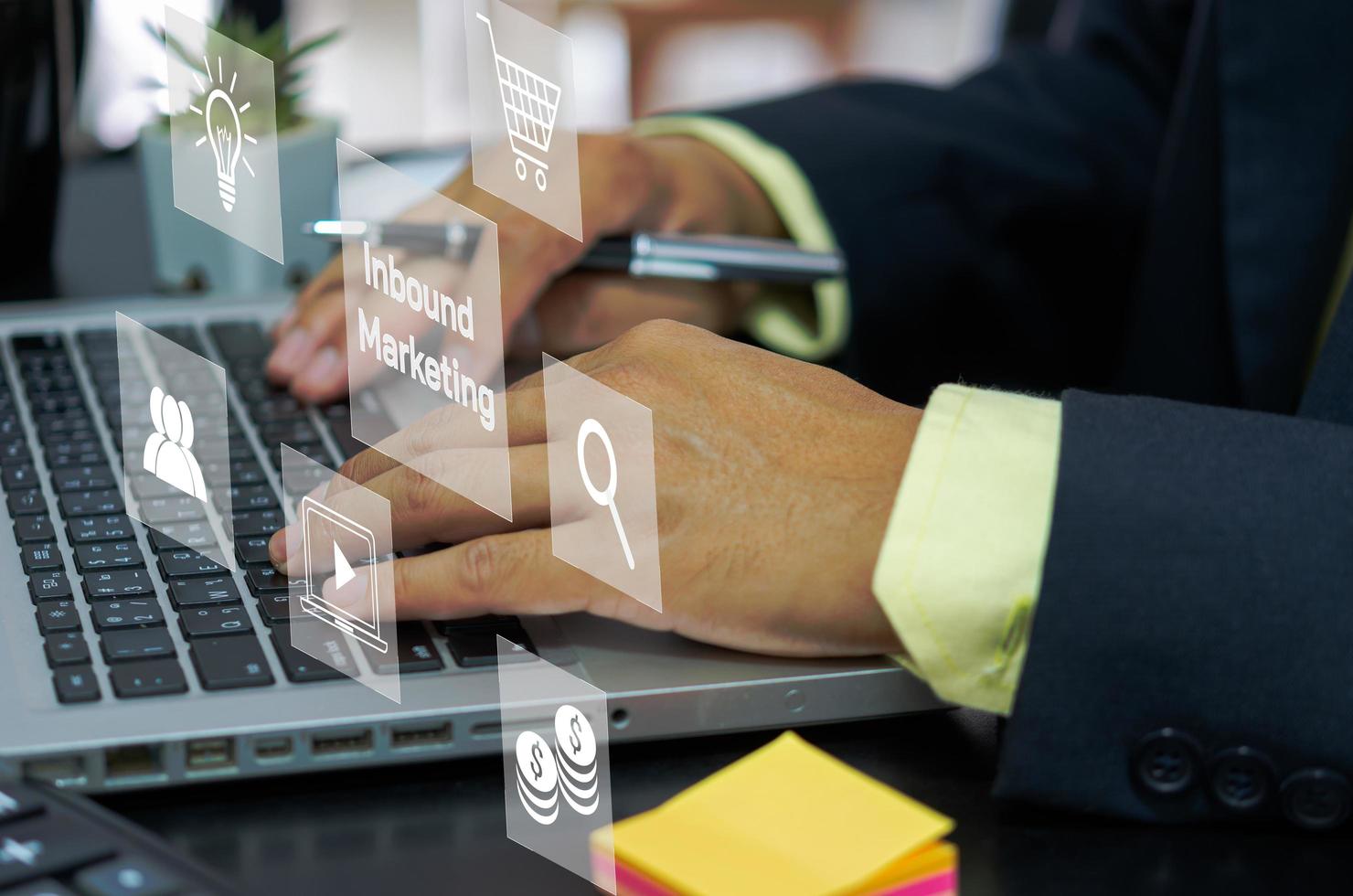 Businessman typing on laptop to Inbound marketing virtual screen investment analysis for future technology concepts. photo