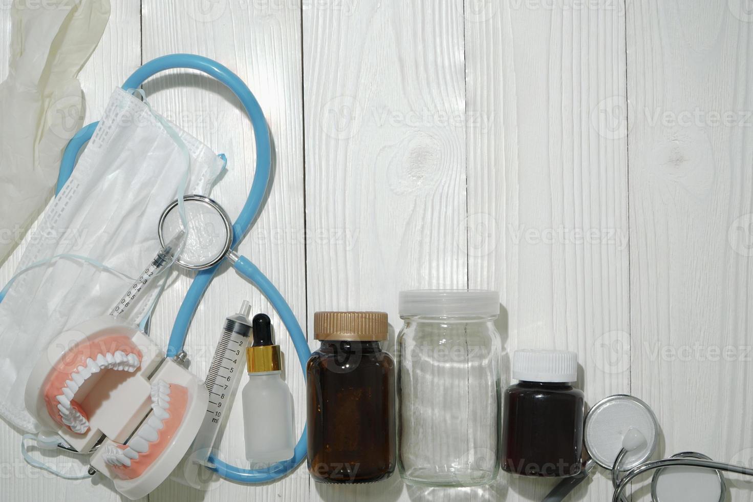Dental care idea on white wood surface with space for text. photo
