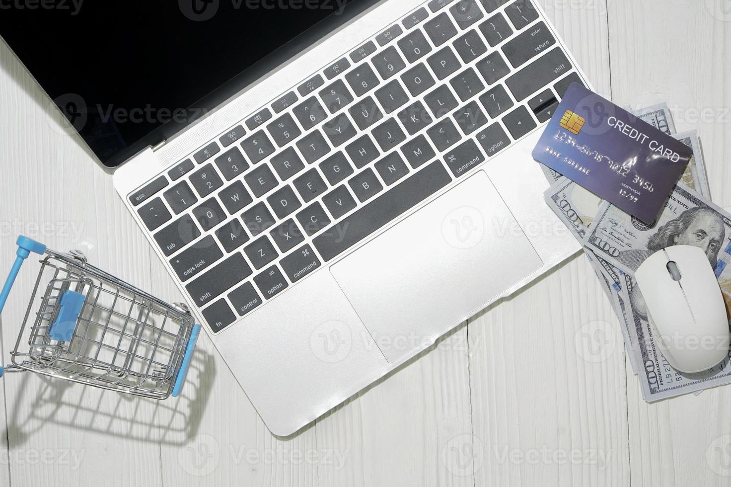 Top view laptop the concept of online shopping. photo