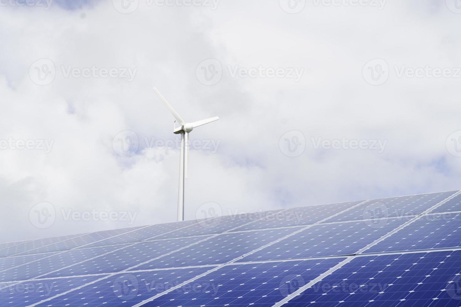 Wind turbines and solar panels, renewable energy. photo