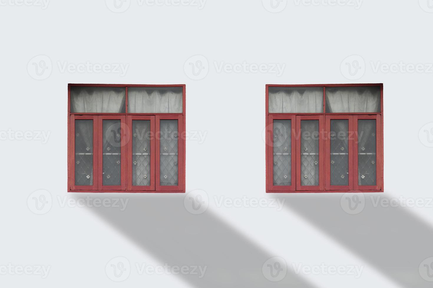 Front view of colorful window on white wall. photo