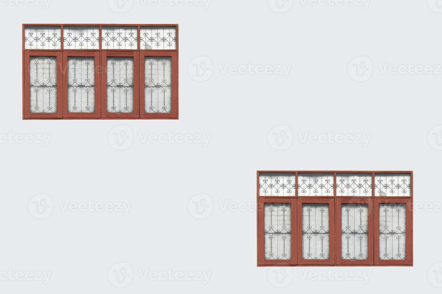 Front view of colorful window on white wall. photo