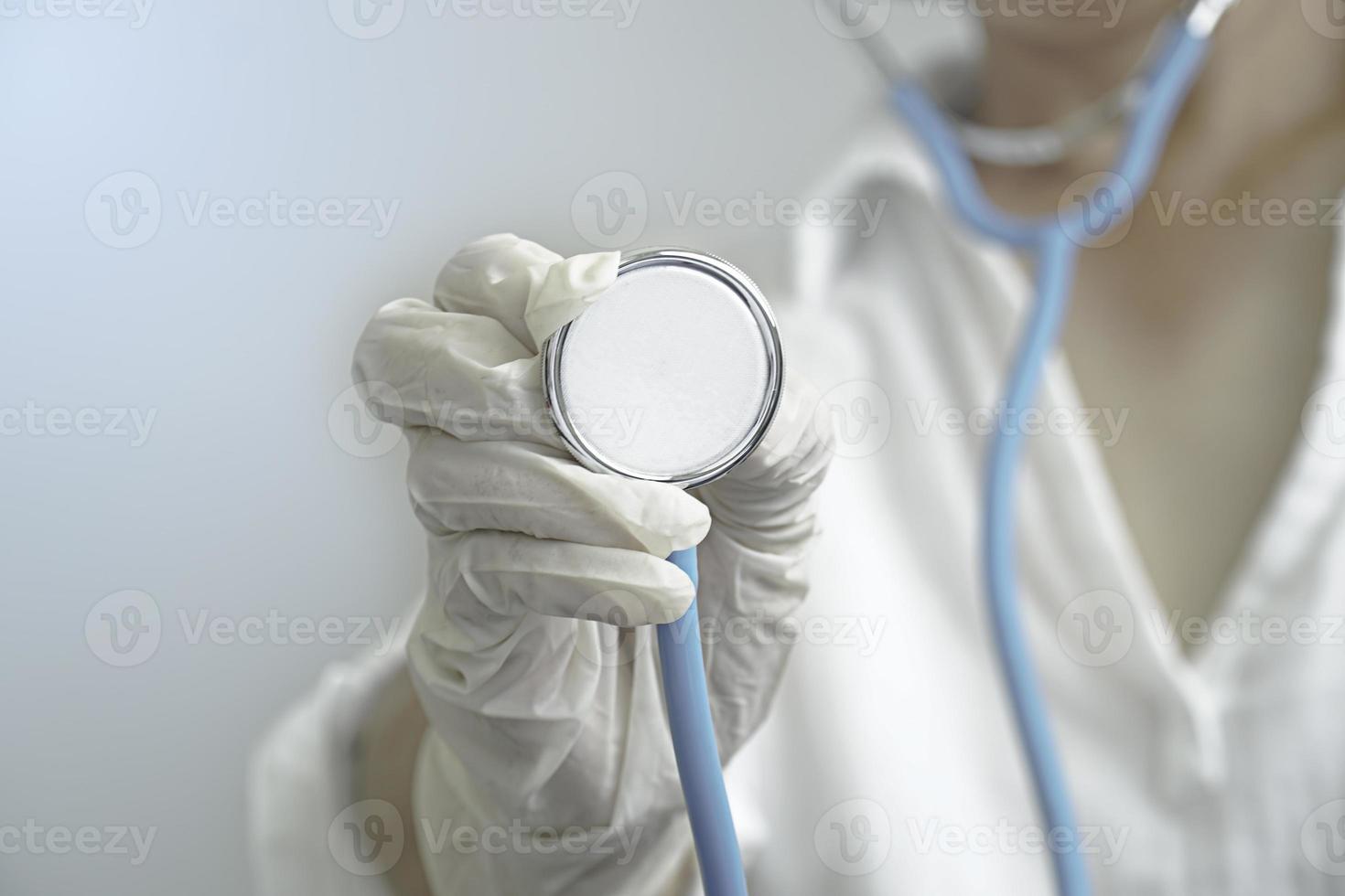 woman doctor with a stethoscope in the hands. photo