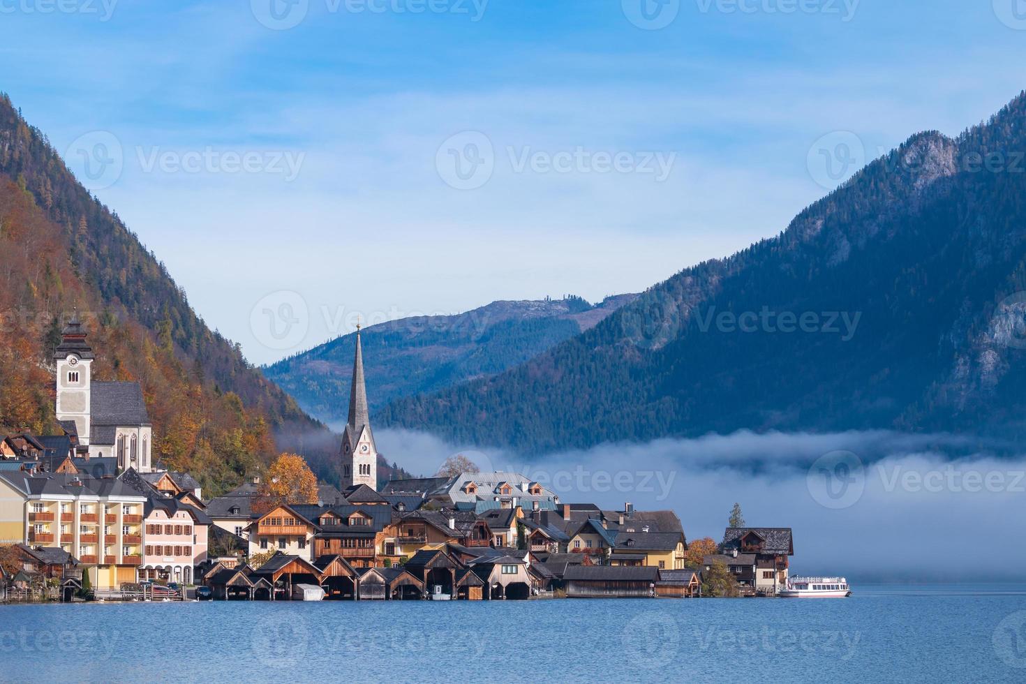 Hallstatt mountain village on a sunny day from classic postcard viewpoint Salzkammergut Austria photo