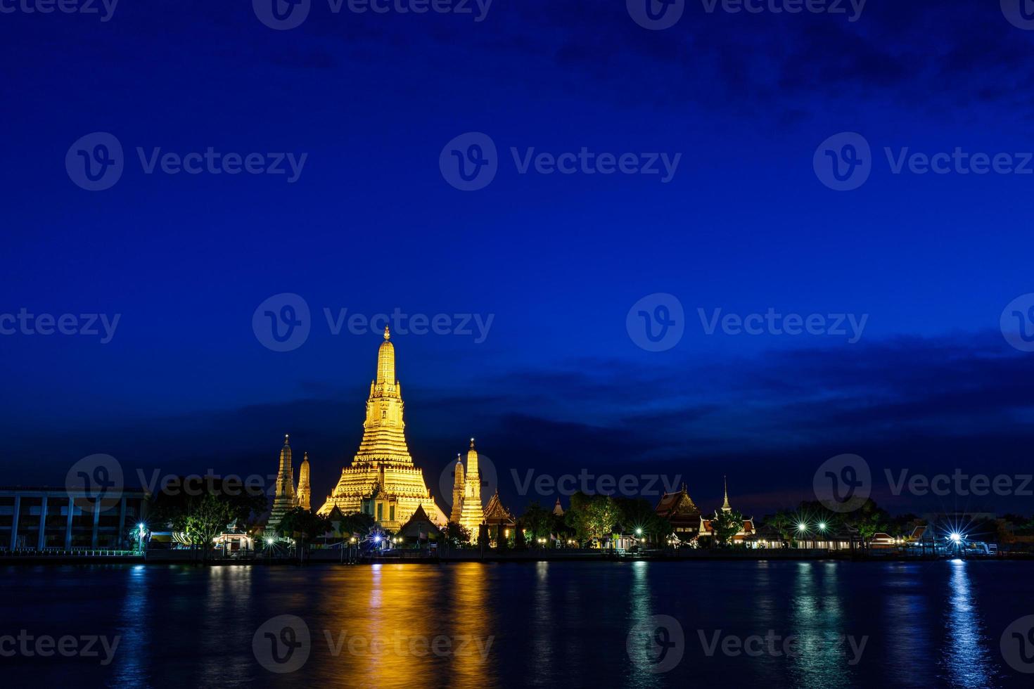 Wat Arun Temple of dawn at twilight Bangkok Thailand photo
