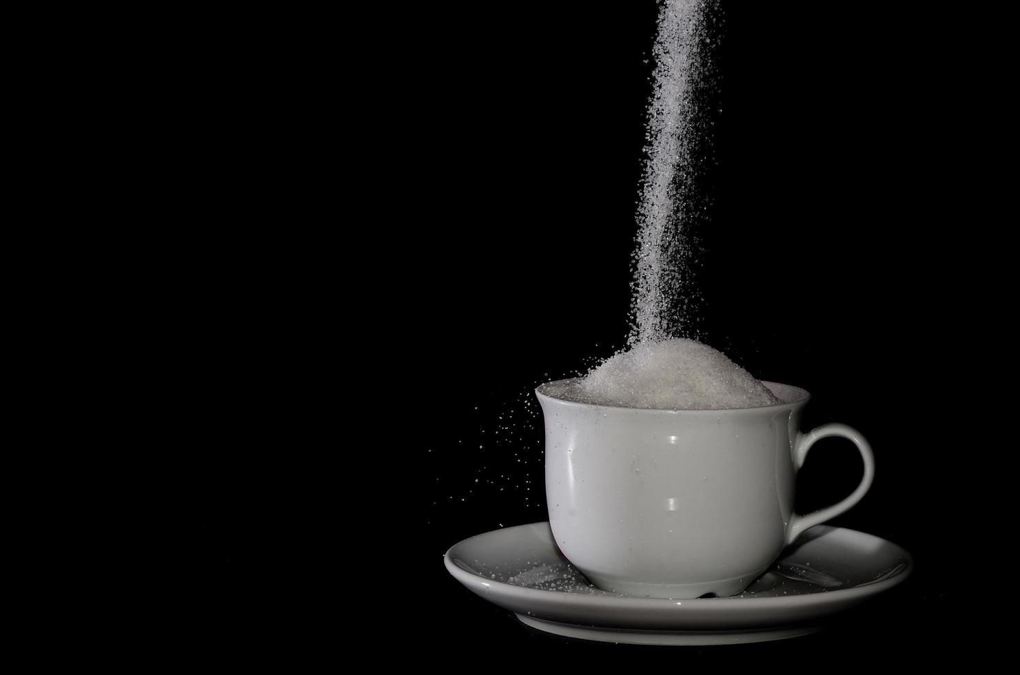 full cup with sugar photo