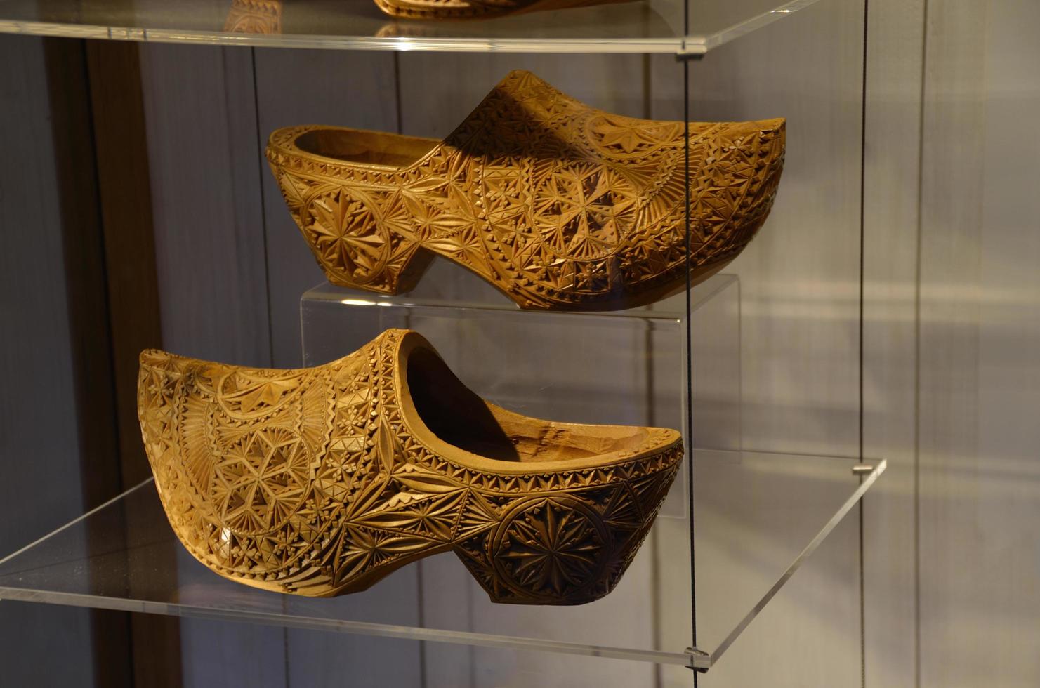 wooden shoes in a vitrine photo