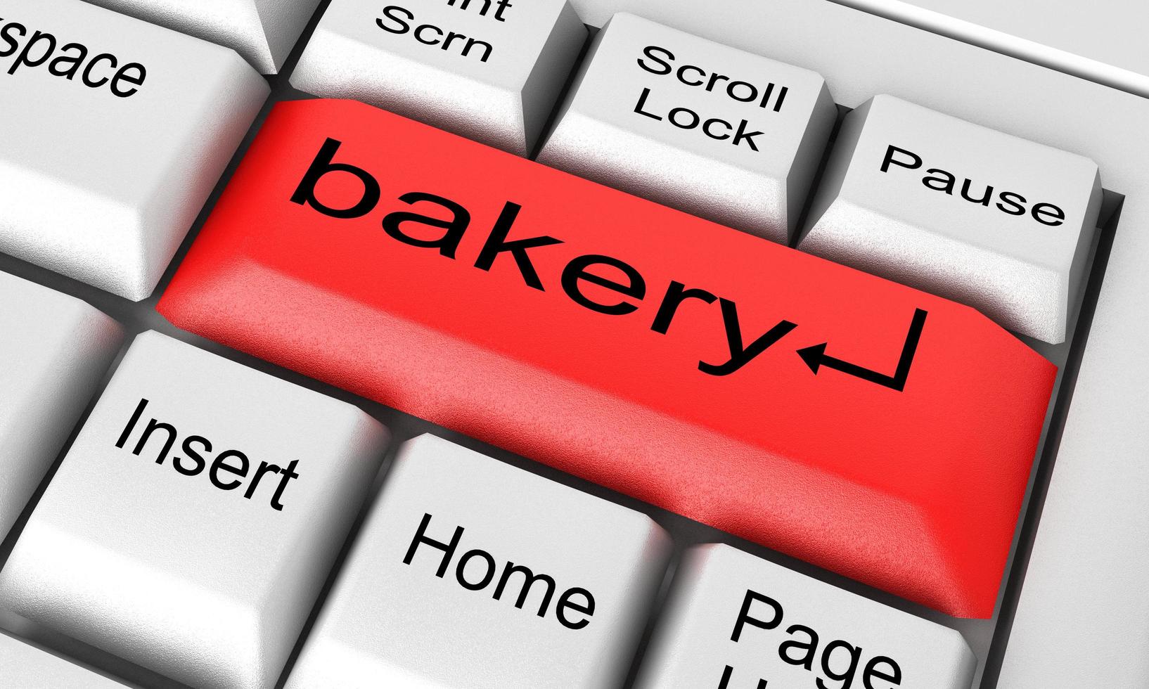 palabra de panadería en el teclado blanco foto