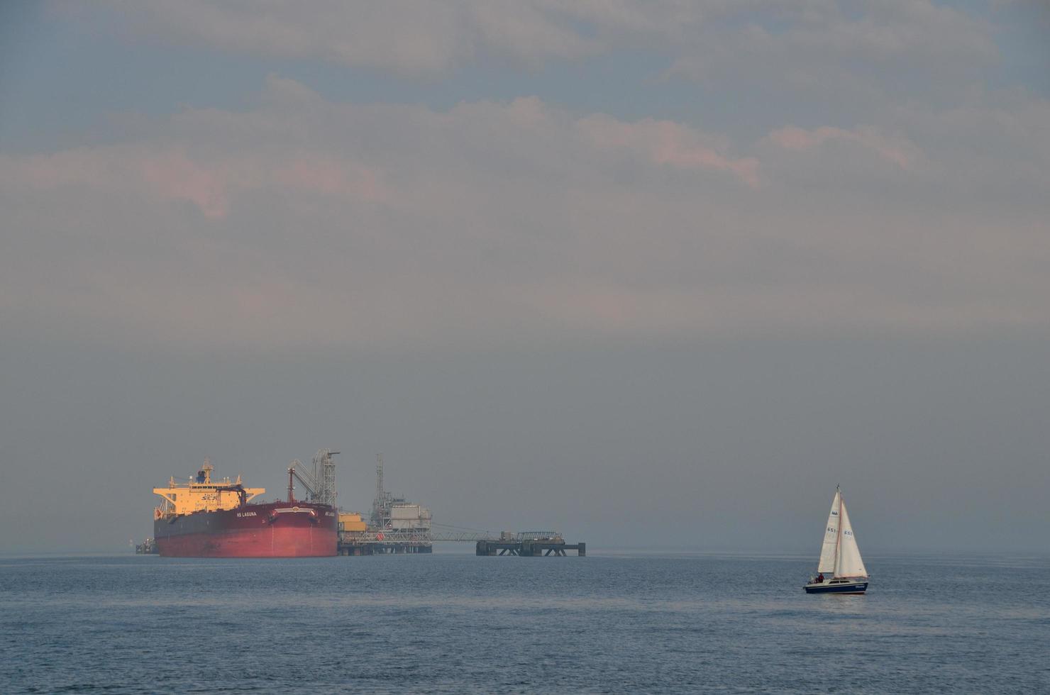 huge and sailboat at sea photo