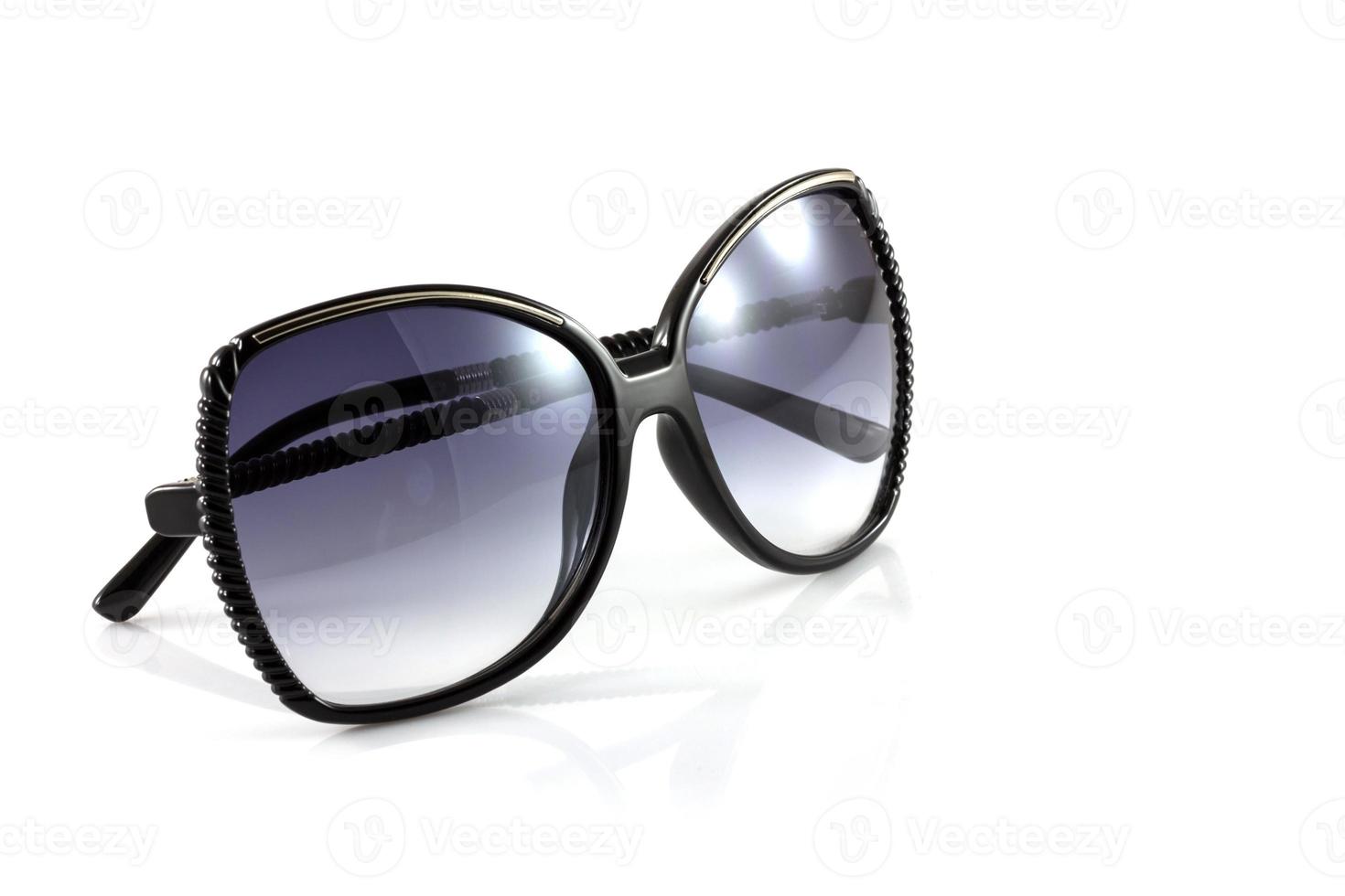 Black fashion sunglasses isolate on white background photo