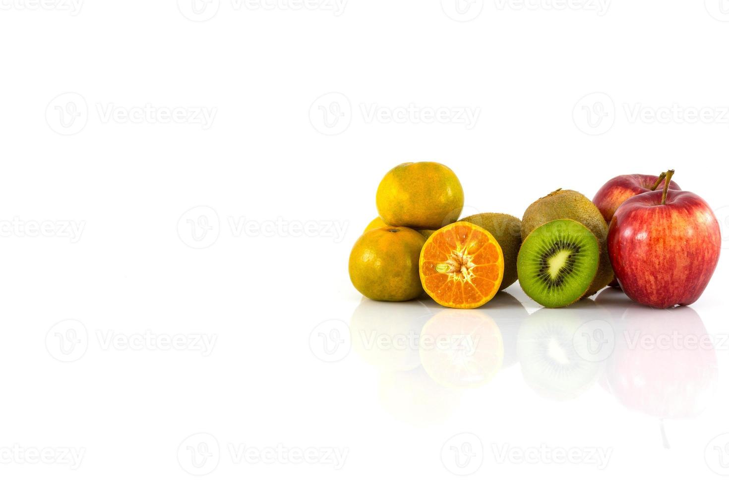 Apple, kiwi and orange isolate on white background photo