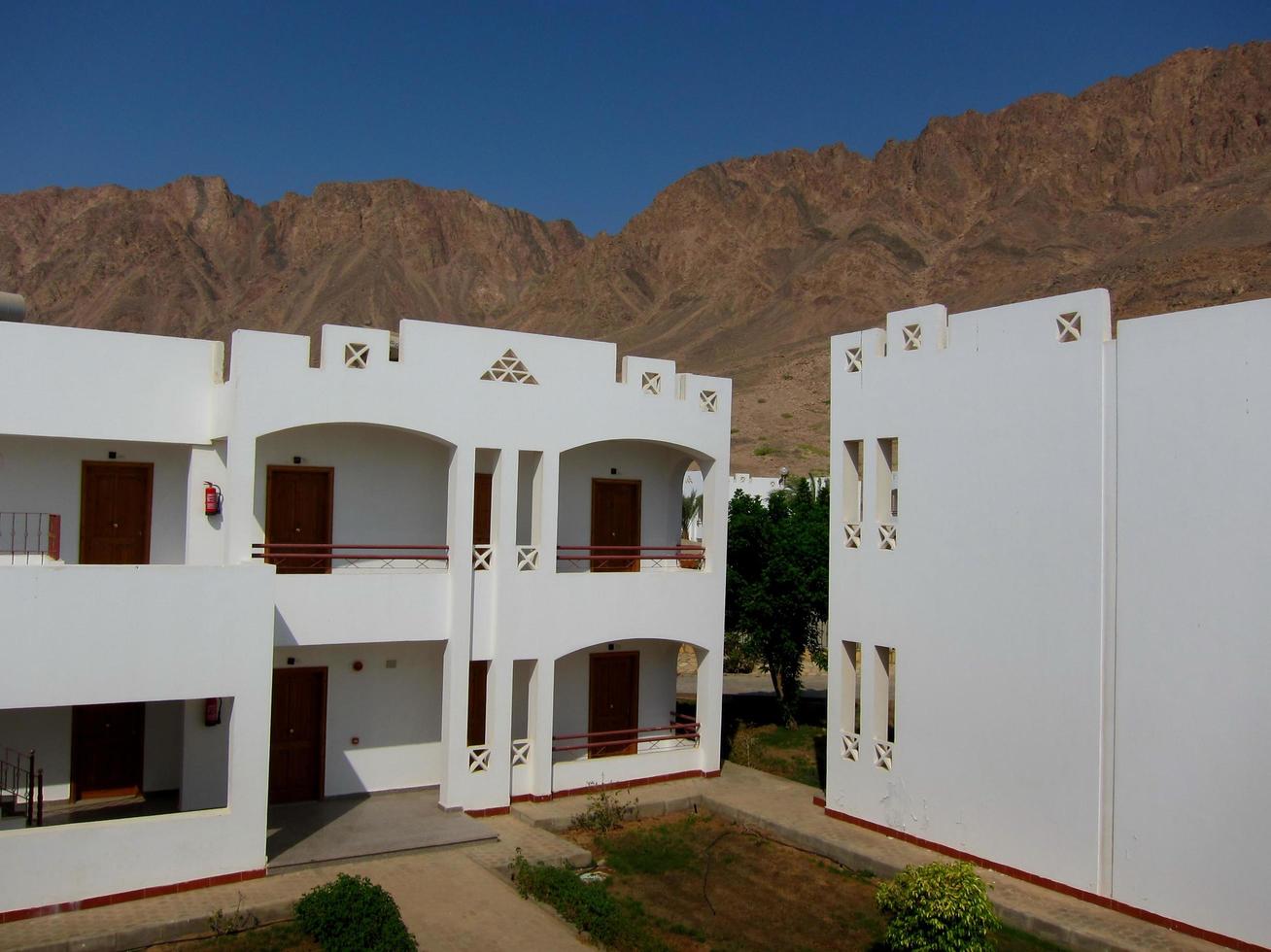 beautiful white apartments and house photo