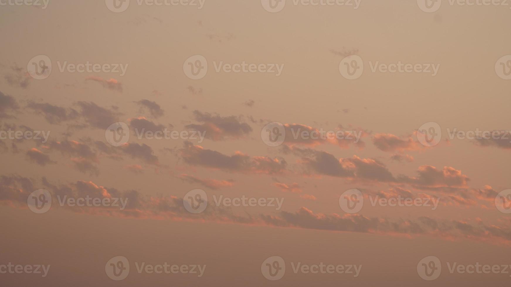 The beautiful sunset view with the silhouette and colorful clouds sky in the city photo