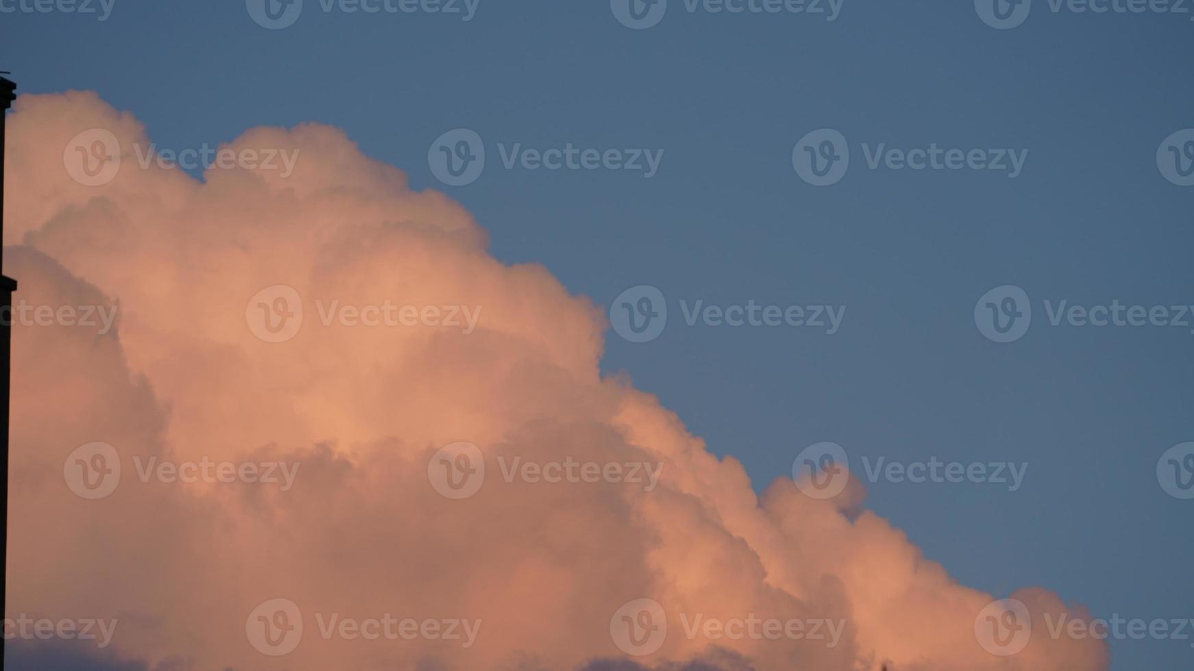 The beautiful sunset view with the silhouette and colorful clouds sky in the city photo
