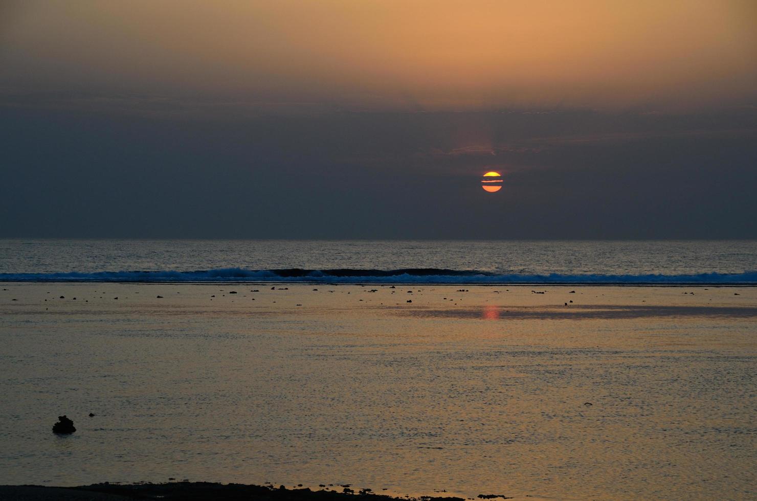 ocean and sunrise photo