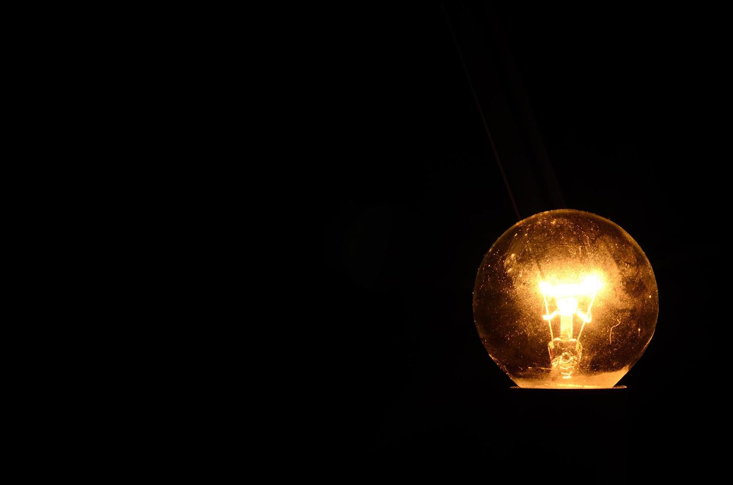 bulb in darkness photo