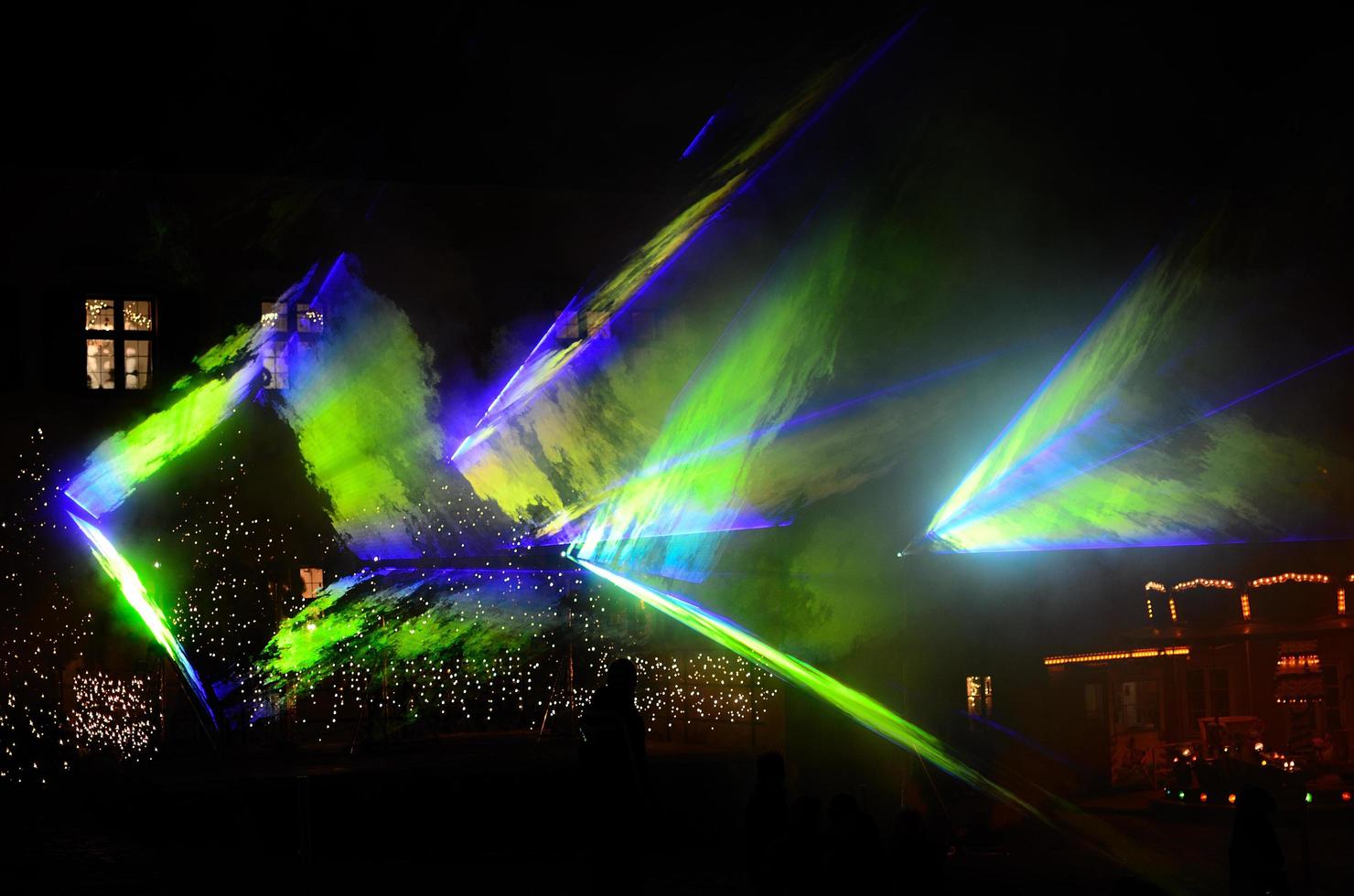 laser show with blue green forms photo