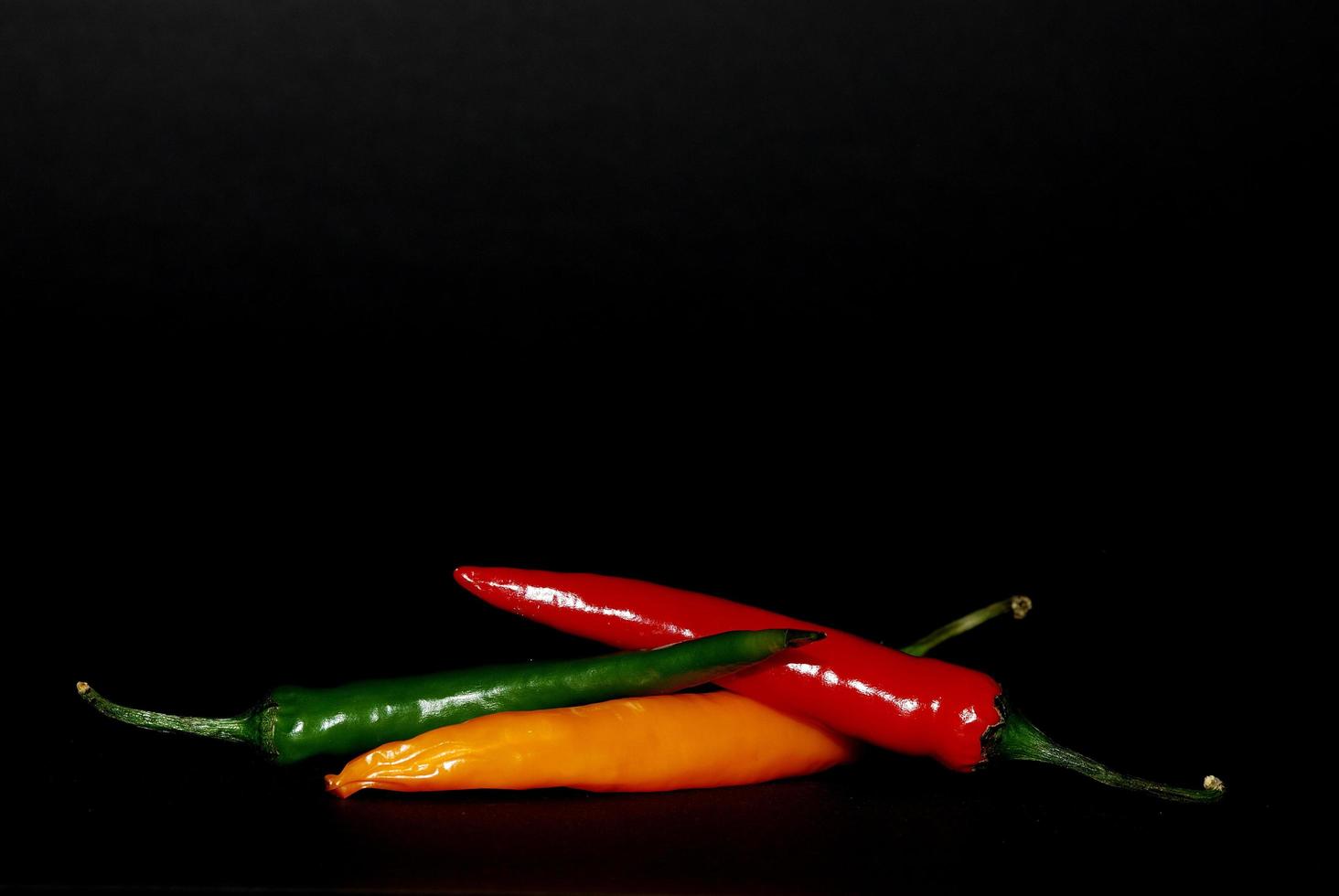 colorful pepper on black photo