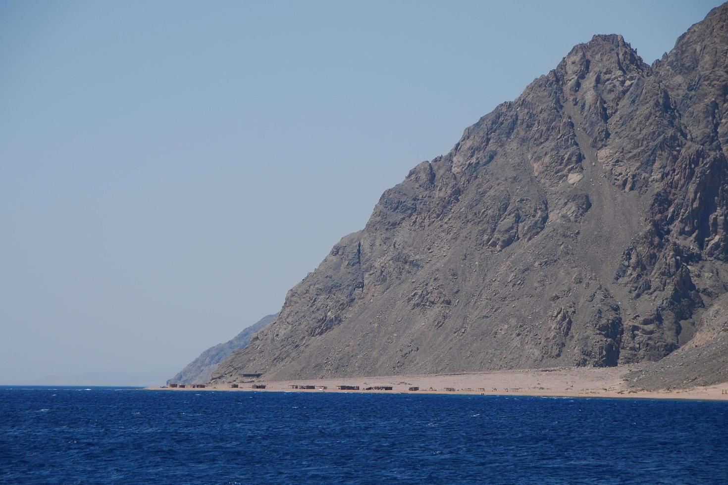 beach sea and mountain photo