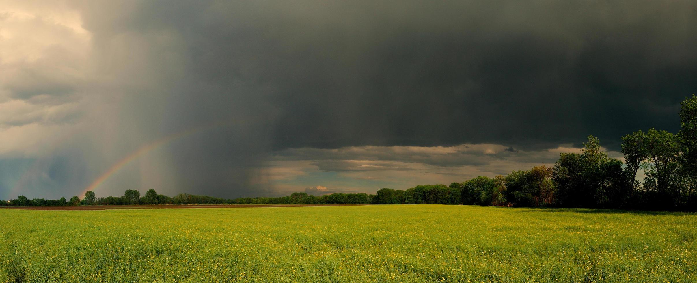 rainbow panorama with field photo